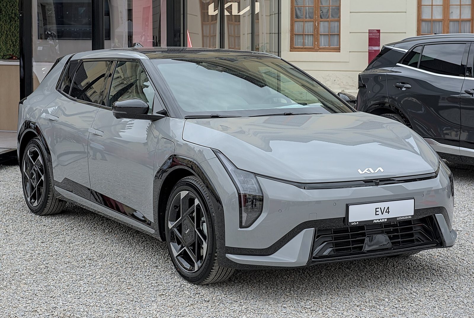 Kia EV4 — photo by Alexander Migl, CC BY-SA 4.0, via Wikimedia Commons